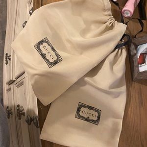 Tan Gucci duster bags for shoes